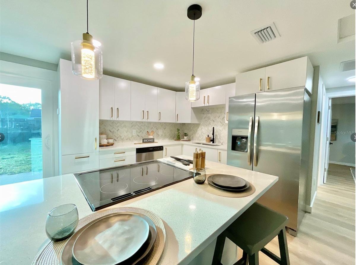 New kitchen, quartz and tile