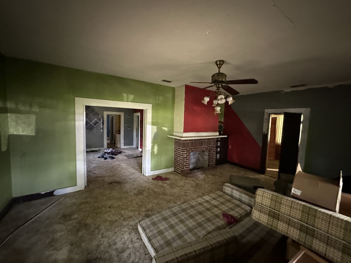 Stained carpet, furniture left behind