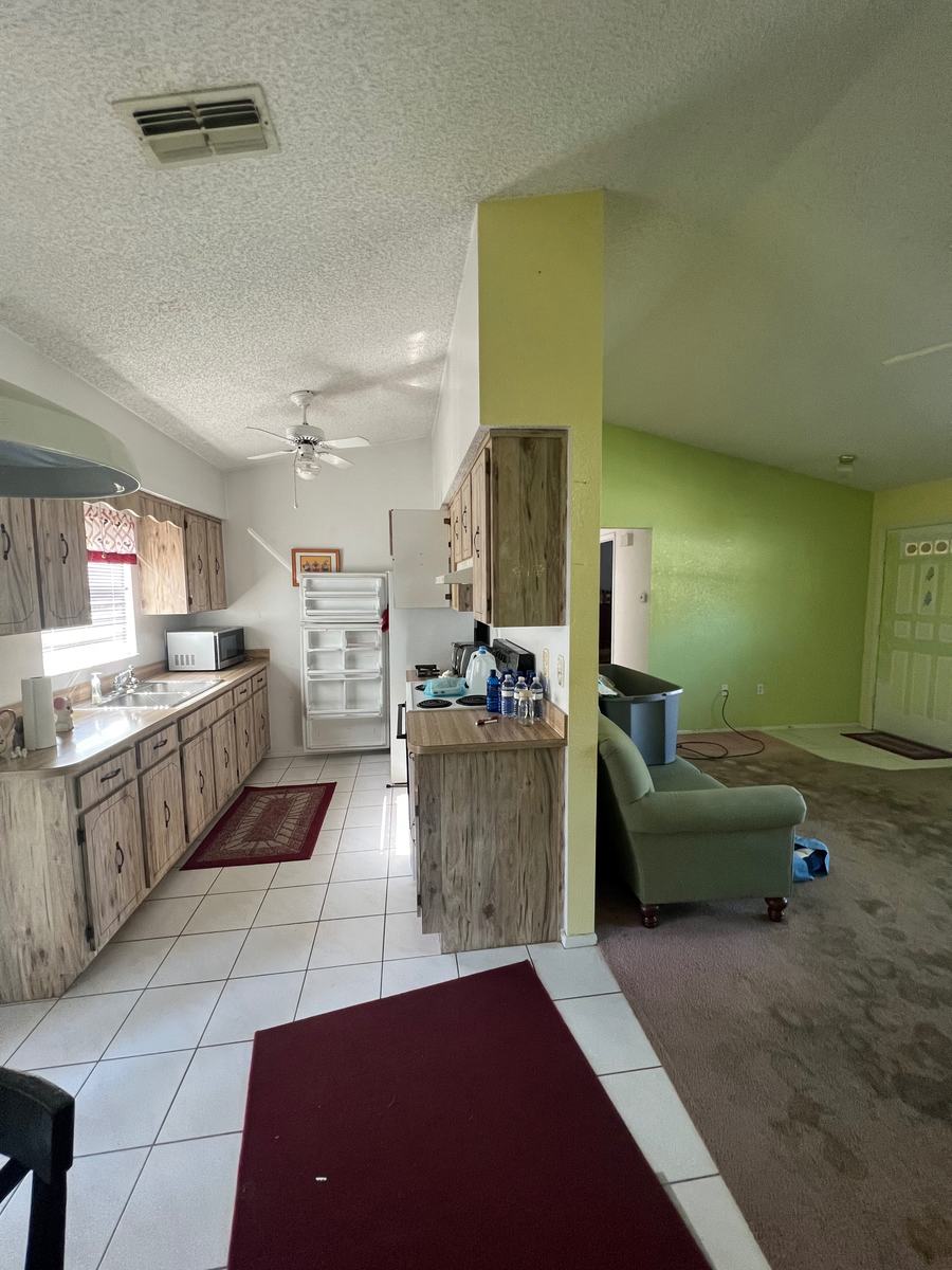 Dated cabinets, worn finishes